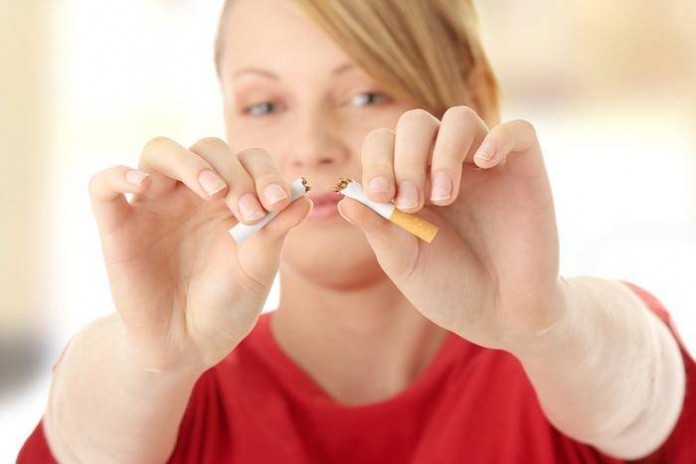 Young caucasian woman quitting smoking quitting smoking