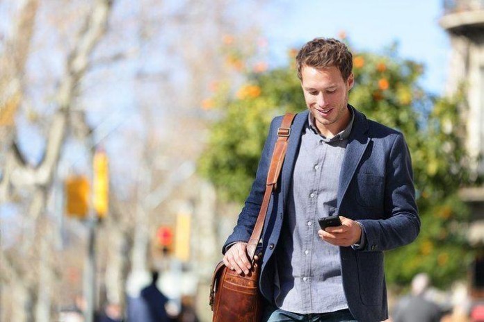 using phone man using phone