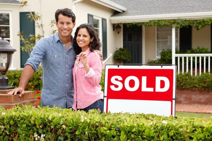 young couple purchase home