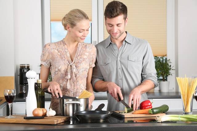 preparing food in kitchen