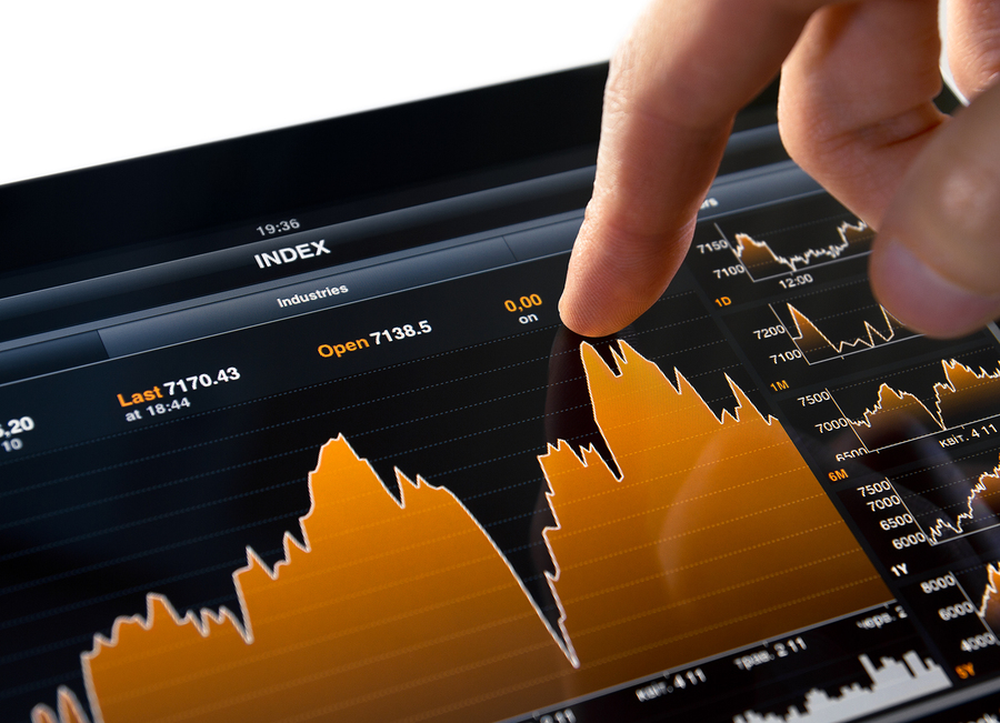 Touching stock market graph on a touch screen device.