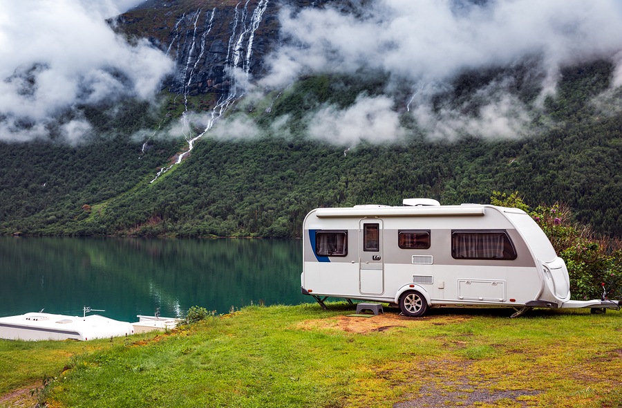 Family vacation travel RV, holiday trip in motorhome, Caravan car Vacation. Beautiful Nature Norway natural landscape.