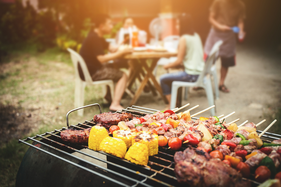 BBQ food party summer grilling meat in the afternoon of weekend happy party of asian people family.