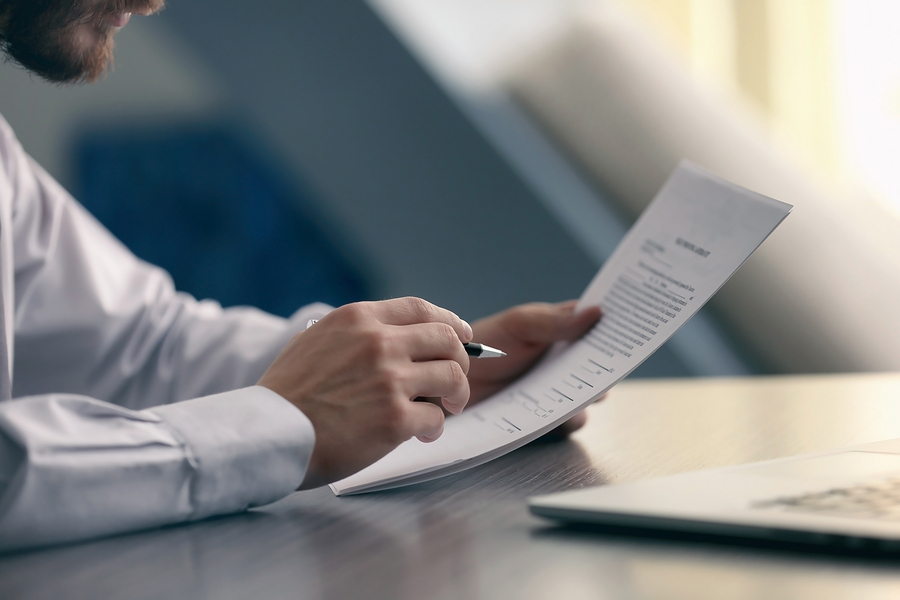 Businessman reading documents