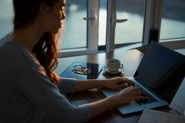 Woman writing blog posts