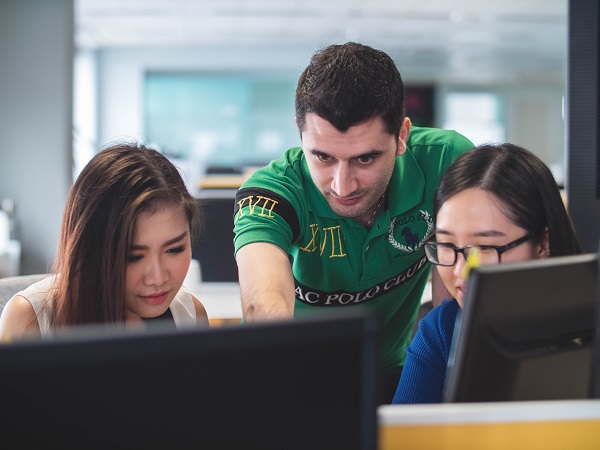 Group of people on computers