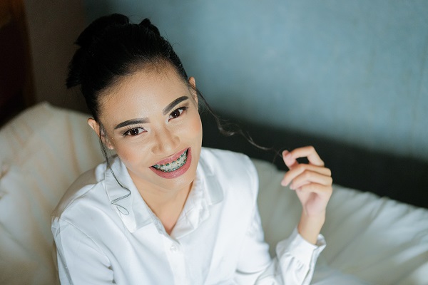 Girl with braces smiling