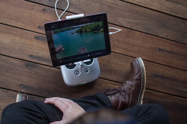 Man streaming content via a tablet