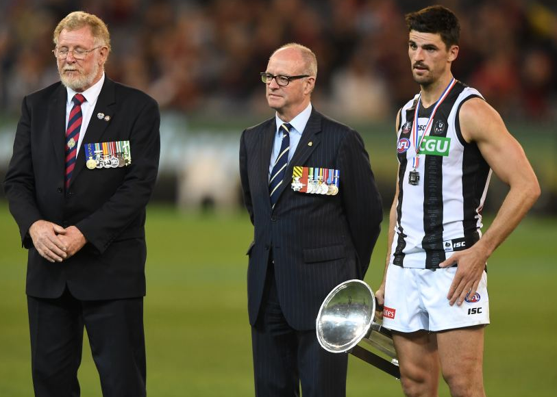 Anzac Day match mired by controversy as Essendon fans boo Pendlebury