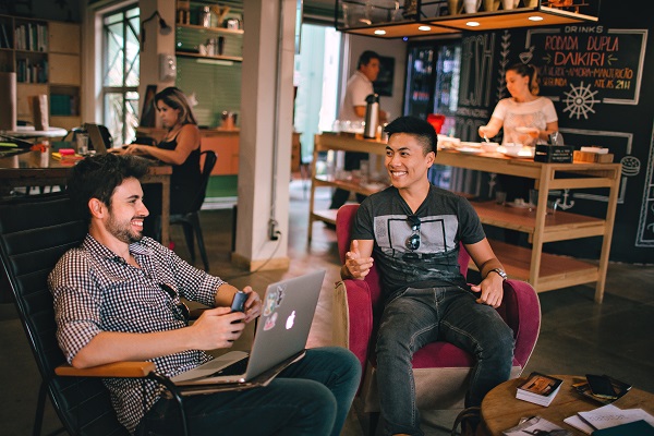 Men talking in a casual office