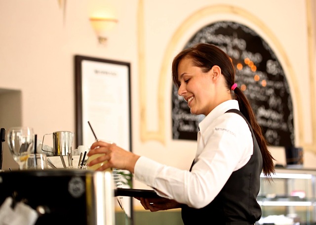 Waitress serving drinks