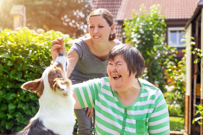 Mentally Disabled Woman With A Second Woman And A Companion Dog, Why being an NDIS provider is extremely beneficial