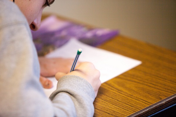 Person sitting a placement test