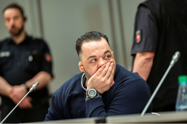 German nurse accused of killing a hundred patients apologizes to victims’ relatives