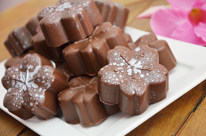 Chocolates in a white plate.