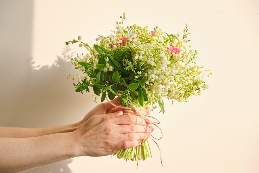 Beautiful fresh bouquet of lily of the valley flowers