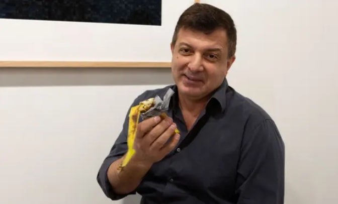 “Hungry” artist eats banana art installation bought for $120,000