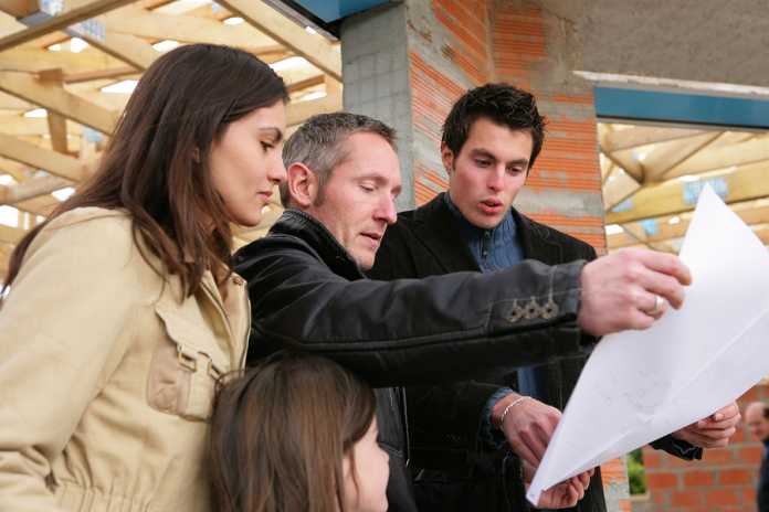 Family and property developer in building site How to find financing for property development