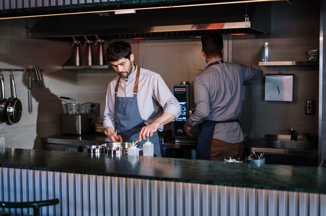 A sneak peek at two chefs in the food industry kitchen preparing for digitization trends and future forecasts.