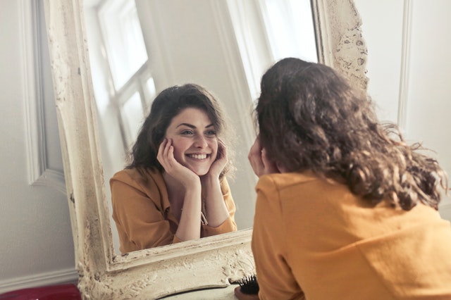 Perfect smile in the mirror